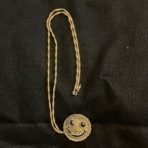 Elegant vintage Gold Smiley Face Crown Trifari necklace with pendant